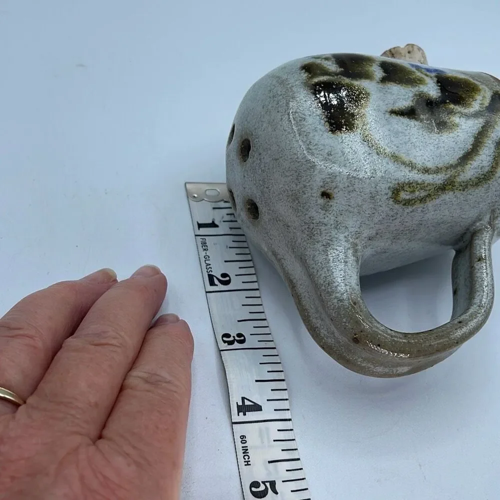 Handmade pottery crockery parmigiana shaker.